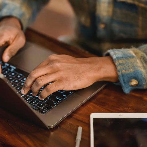 Woman behind laptop